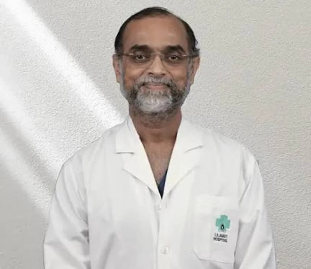 Dr. Ajit R. Menon